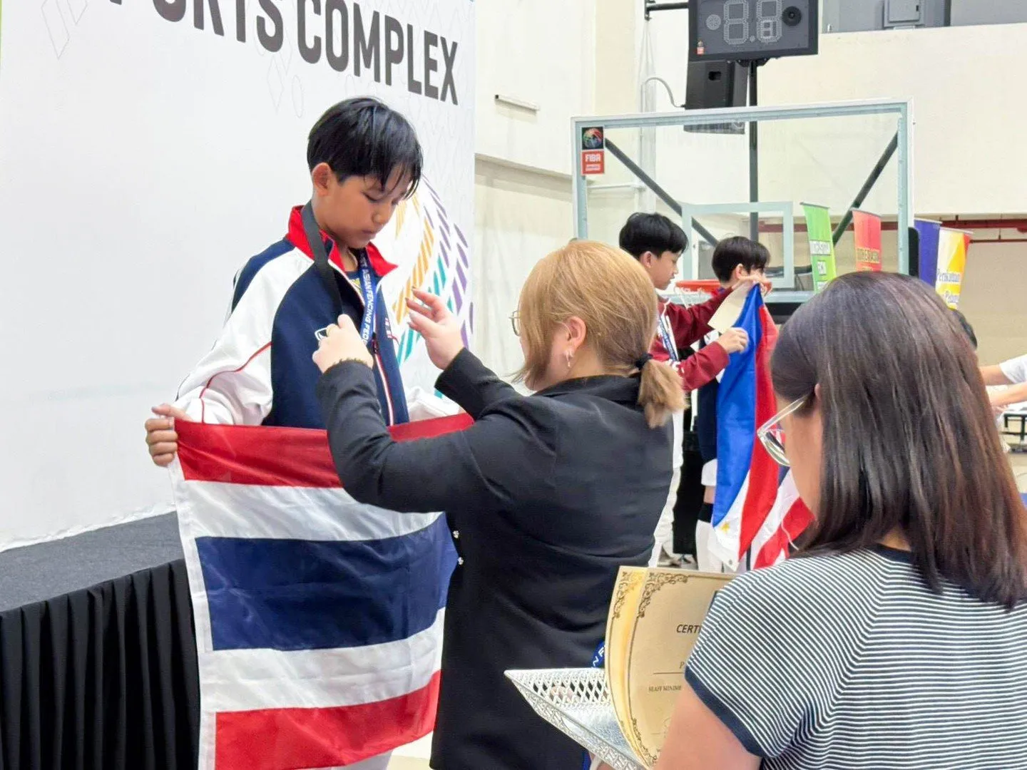Pluem receiving his medal at the SEAFF Championships in Kuala Lumpur