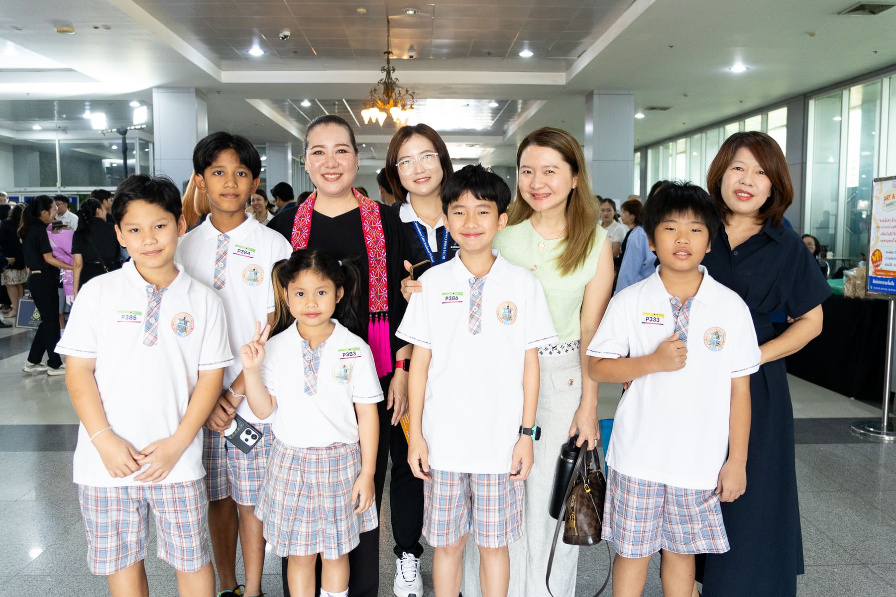 BCIS award recipients arriving at JJ Mall with staff ahead of the ceremony