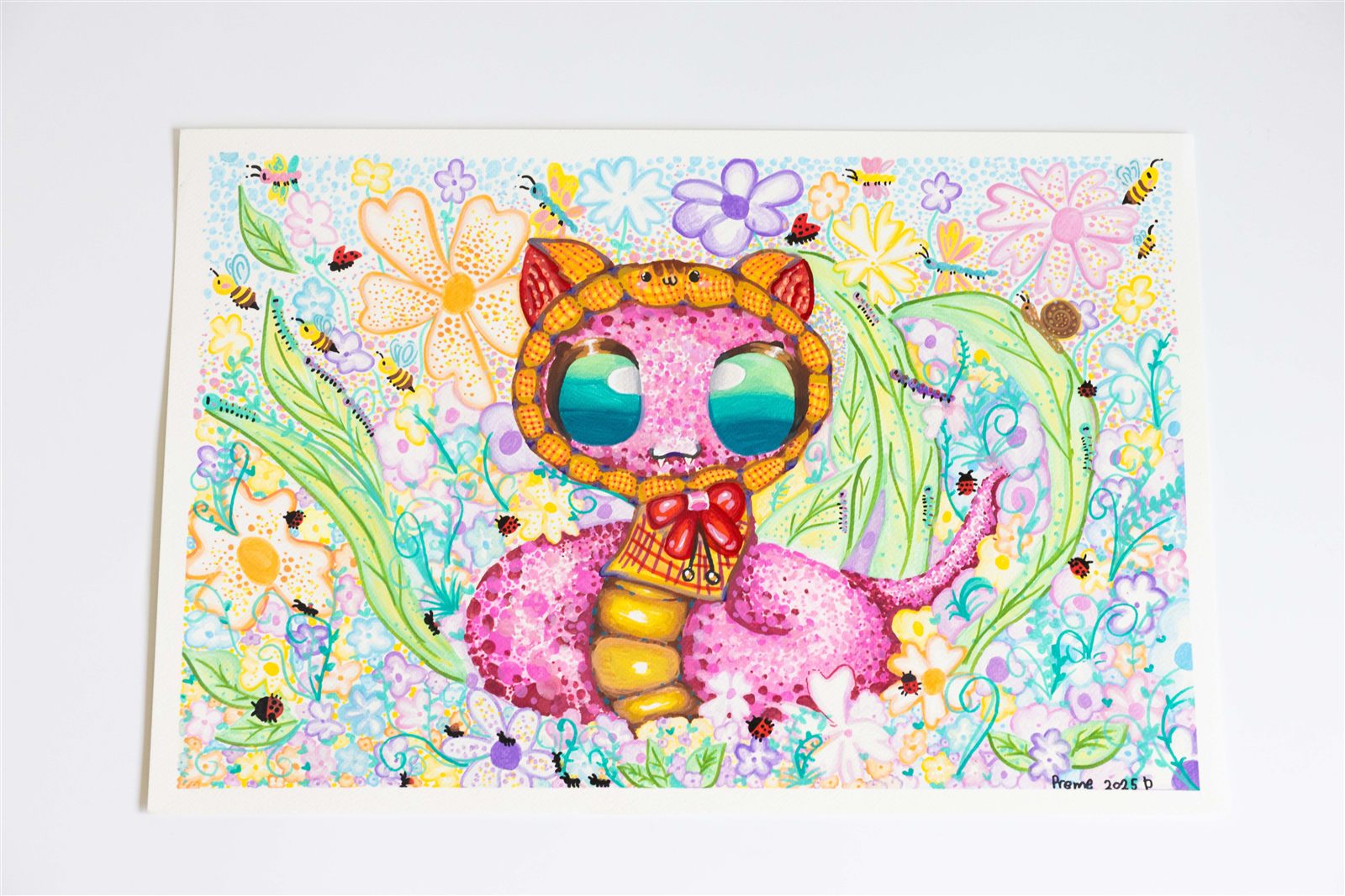 Student painting of a pink cat creature surrounded by flowers and bees