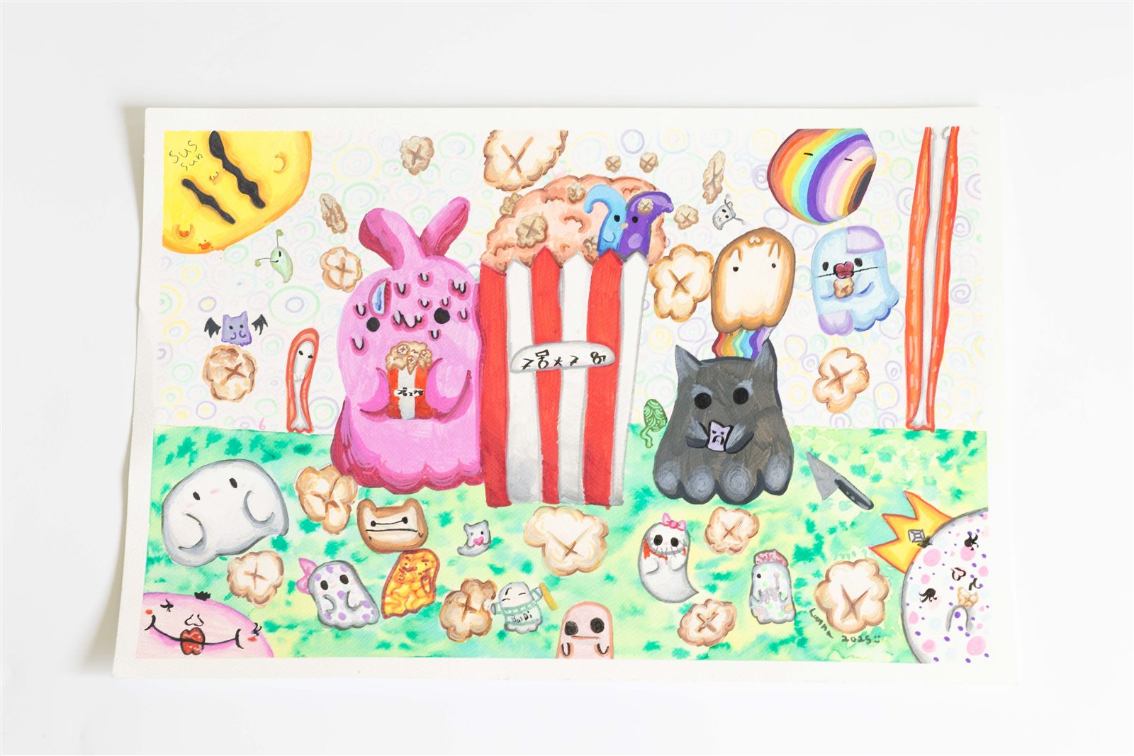 Student painting of playful popcorn and bunny characters