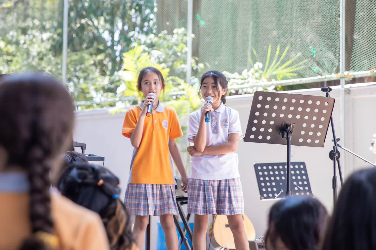 BCIS students singing at an open mic event